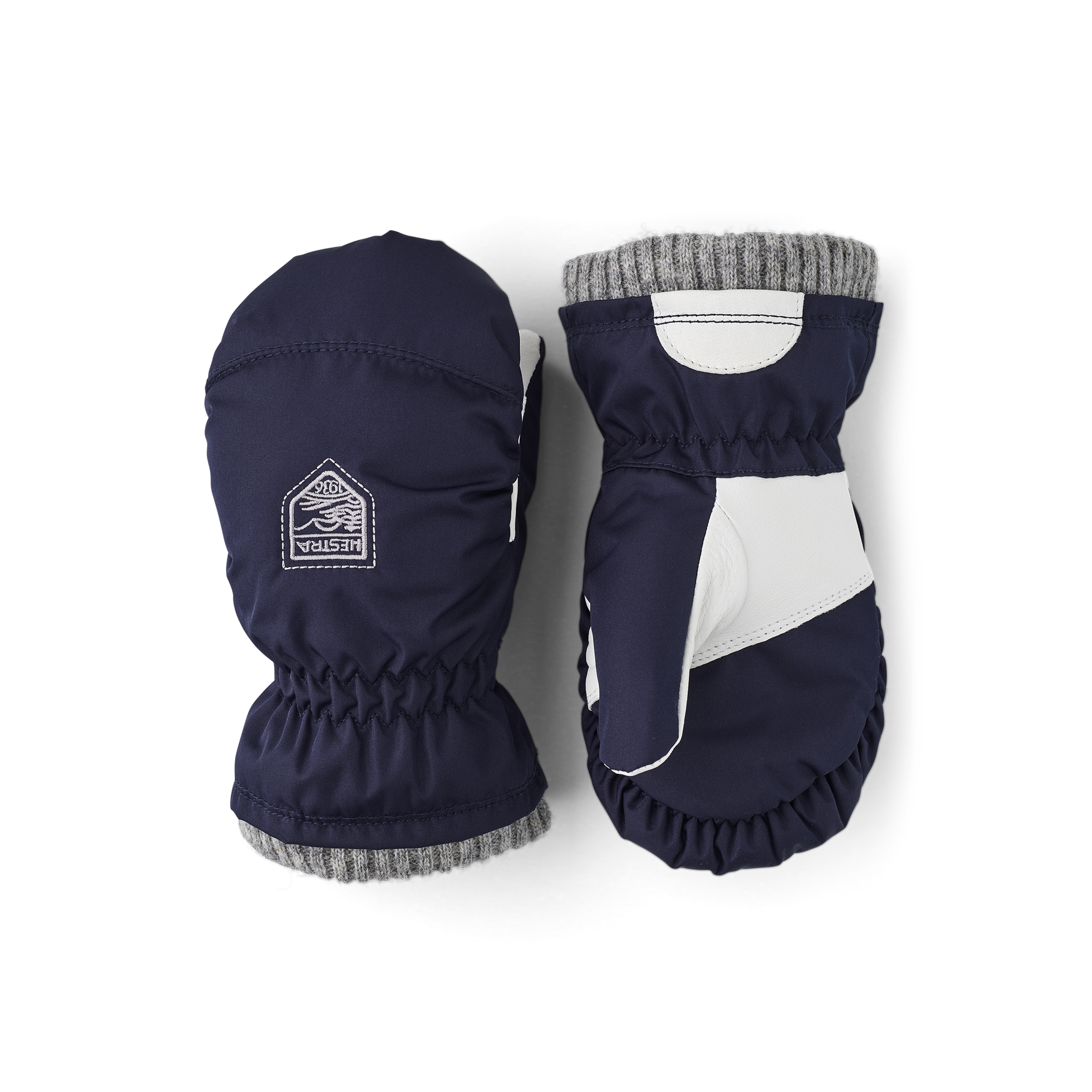 Dark blue fabric mitten with gray cuff and white hairsheep palm